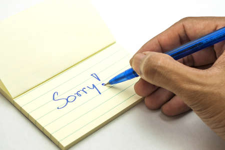 a handwritten notes with sorry message の写真素材