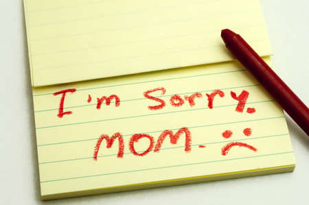 a handwritten notes with sorry message 