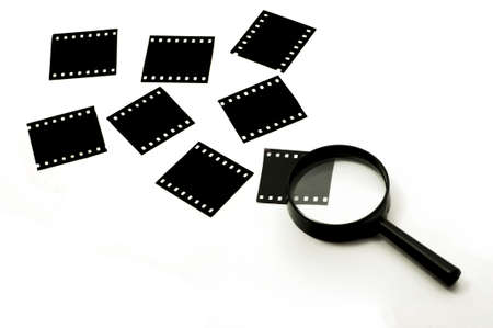 Slide film and magnifier glass,conceptの写真素材