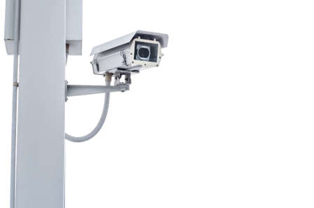 Security camera on the post with outdoor housingの写真素材