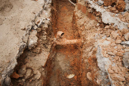 Plumbing pipe fixing beneth the groundの写真素材