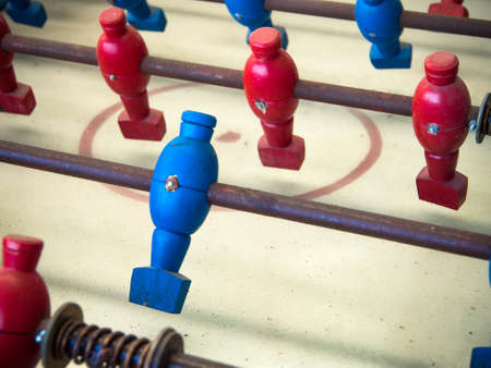 Soccer table game with red and blue players