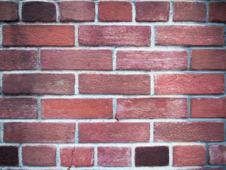 Old historic wall constructed of handmade bricksの写真素材