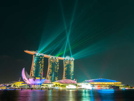 Singapore city at night with laser show のeditorial素材