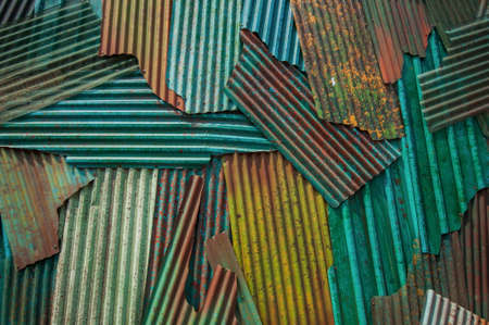Background of old rusted painted metal sheetsの写真素材
