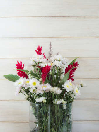 Mixed flower in glass vaseの写真素材