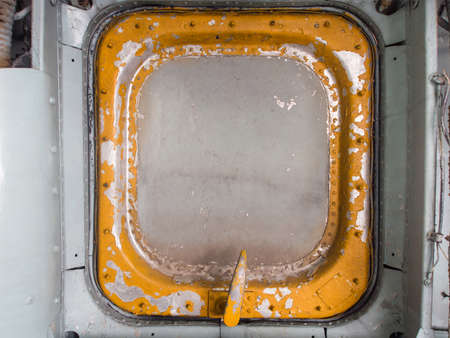 Old metal hatch door on aircraftのeditorial素材