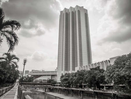 KUALA LUMPUR, MALAYSIA - NOVEMBER 14, 2014: Dayabumi Complex. It is one of the earliest skyscrapers in KL. The facade of the tower is adorned with patterns of eight-pointed stars, and Islamic arches.のeditorial素材