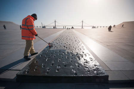 Dalian, China - January 19, 2015 : Sculpture complex of 1000 footprints in front of Xinghai Square . The Square covers total area of 1.1 million square metre, making it the largest city square in the world.のeditorial素材