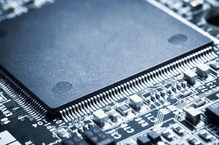Closed up of microprocessor on motherboard. Shallow depth of field.