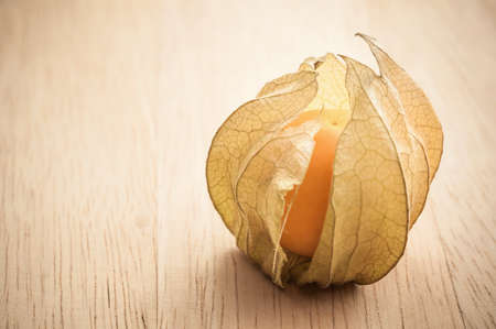 Macro detail image of Cape gooseberry on wooden backgroundの写真素材