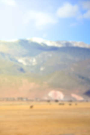 Blur background image of Mountains, clouds and blue skyの写真素材