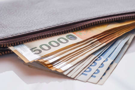 Korea Won currency notes in leather wallet