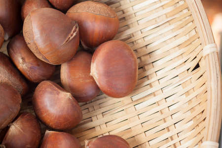 Closed up image of Chestnut on bamboo basketの写真素材