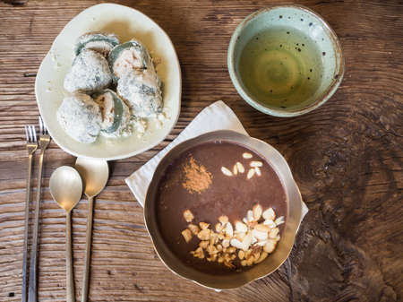 Korean desserts set with Tteok, Red bean porridge,and teaの写真素材