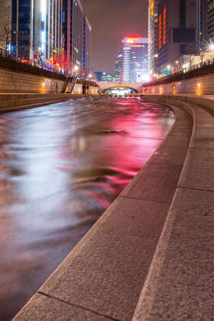 SEOUL, SOUTH KOREA - FEBRUARY 28, 2015: Night light at Cheonggyecheon stream. The stream is a 10.9Â km long, modern public recreation space in Seoul downtown.のeditorial素材
