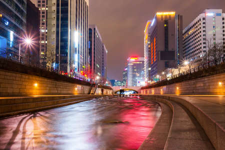 SEOUL, SOUTH KOREA - FEBRUARY 28, 2015: Night light at Cheonggyecheon stream. The stream is a 10.9Â km long, modern public recreation space in Seoul downtown.のeditorial素材