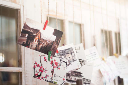 SEOUL, SOUTH KOREA - MARCH 1, 2015 : Photograph and painted poscards art decorating at cafe shop in the streets of the Bukchon district of Seoul.のeditorial素材