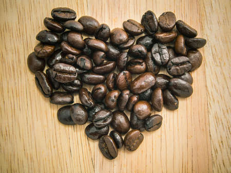 Coffee lover beans arranged as heart shapeの写真素材
