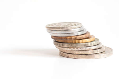 Stack of money coin isolated on white backgroundの写真素材