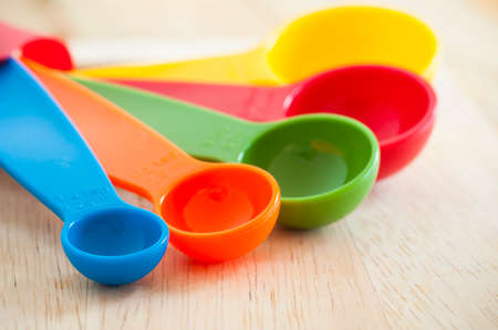 Measuring Spoons set on wood backgroundの写真素材
