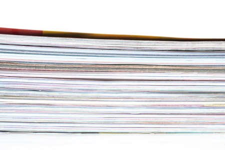 Pile of magazines on white backgroundの写真素材