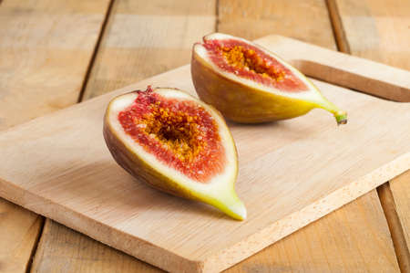 Fresh figs on vintage wooden backgroundの写真素材