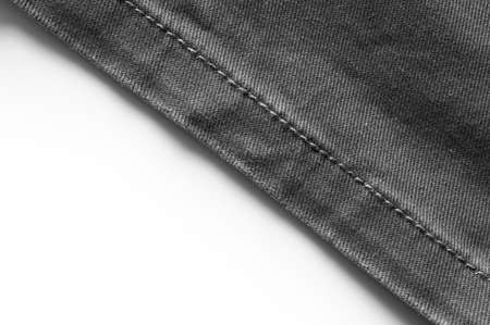 Black denim jeans on white backgroundの写真素材