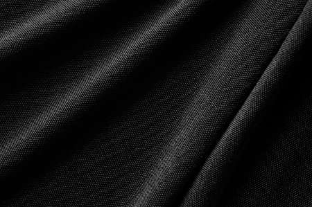 Black Clothes fabric texture background.の写真素材