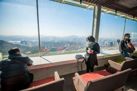 Seoul, South Korea - March 04, 2015 : Tourist at N Seoul Tower lounge with view of Han river and the city.のeditorial素材