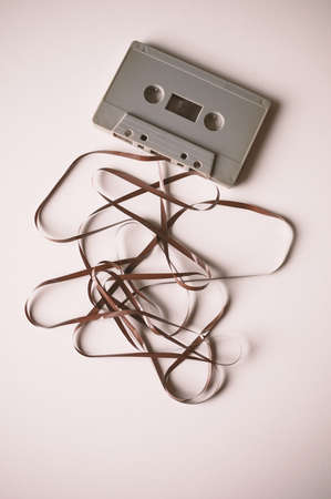 Cassette with mess of tape , retro image processedの写真素材