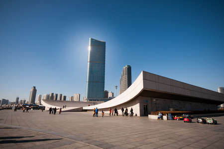 Dalian, China - January 19, 2015 : People enjoy the activities at Xinghai Square.The Square covers total area of 1.1 million square metre, making it the largest city square in the world.のeditorial素材