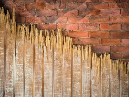 Old brick with torn wood wall texture background
