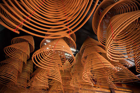 Coils incense for preyer hanging in temple.の写真素材
