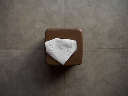 Tissue paper box on cement background