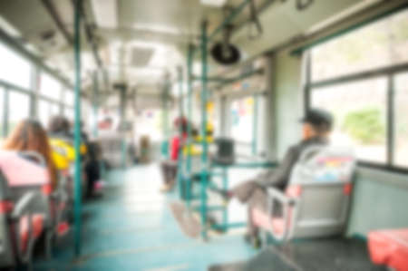 Blur background image of Public bus with passengers at Busan, Korea.