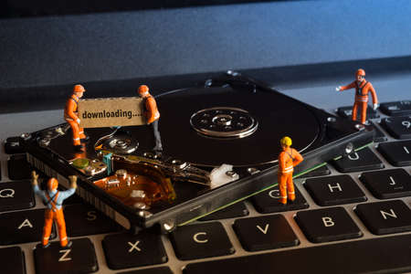 Group of worker working on computer hardisk drive, Disk management conceptの写真素材