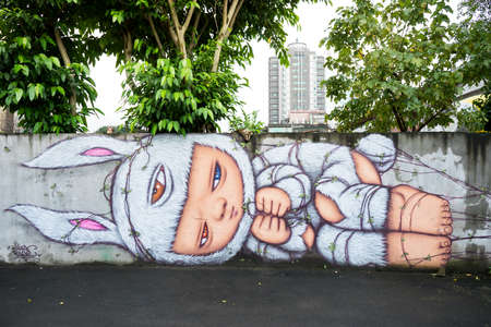 Taipei, Taiwan - February 28, 2016 : Graffiti on the wall in Huashan Creative Park. The park was rebuilt and allow creative artist to show their artworks.のeditorial素材