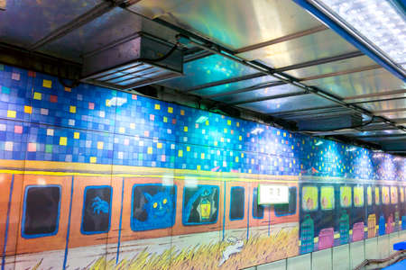 Taipei Taiwan - February 27, 2016 : Jimmy Liao Arts on Nangang metro station wall. Jimmy Liao is a Taiwanese illustrator as well as a picture book  writer such as A Chance of Sunshine ,  Turn Left, Turn Right, A Fish With A Smile and etc.のeditorial素材