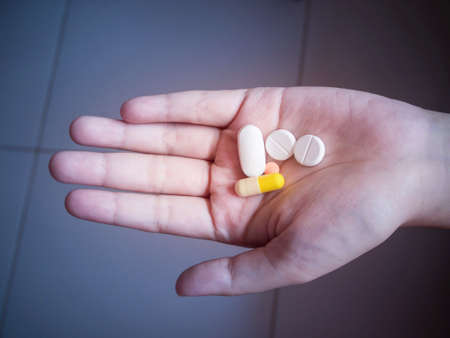 Pills in hand.の写真素材