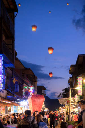 Pingxi, Taiwan - February 29 , 2016 : People enjoy launching paper lantern with wishing word at...