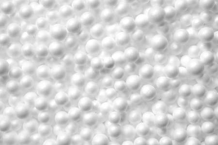 Polystyrene foam. Foam beads textured. White foam background.の写真素材