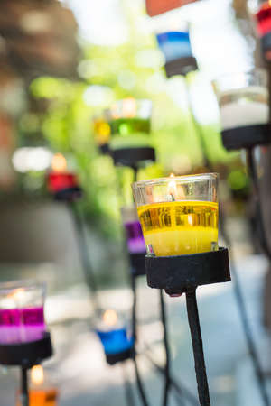 Candle in glass holder can use for festive background.の写真素材