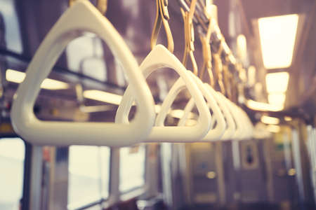 Metro subway handrail inside the car.の写真素材