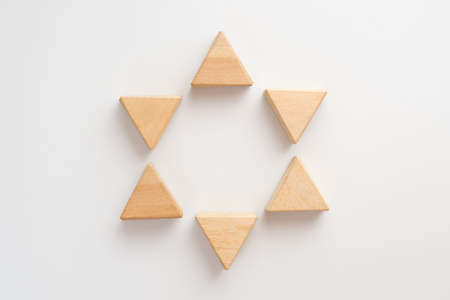 Wooden star on white background can use for business presentation template or bullet or infographics.の写真素材