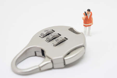 Business security concept. Technician specialist with key lock problem.の写真素材