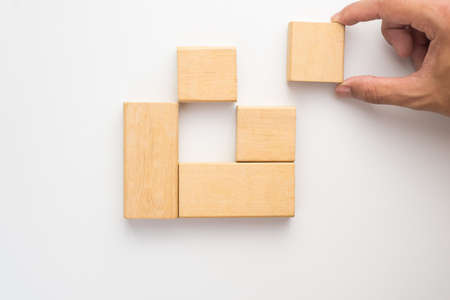 Wood block arranging as stack step with hand filling space can use for business template or bullet.