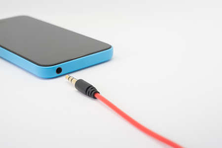 Earphone audio jack to smartphoneの写真素材