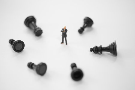 Concept of business strategy. Businessman with a lose chess pawn.の写真素材