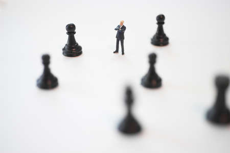 Concept of business strategy. Businessman with a chess pawn.の写真素材